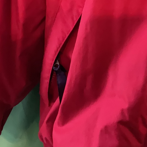 Bright red windbreaker with navy blue fleece lining and insulated sleeves. - Picture 5 of 11